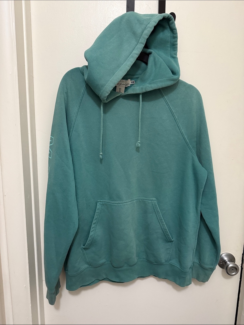 H&M Teal Hooded Sweatshirt with wording Maintain on sleeves